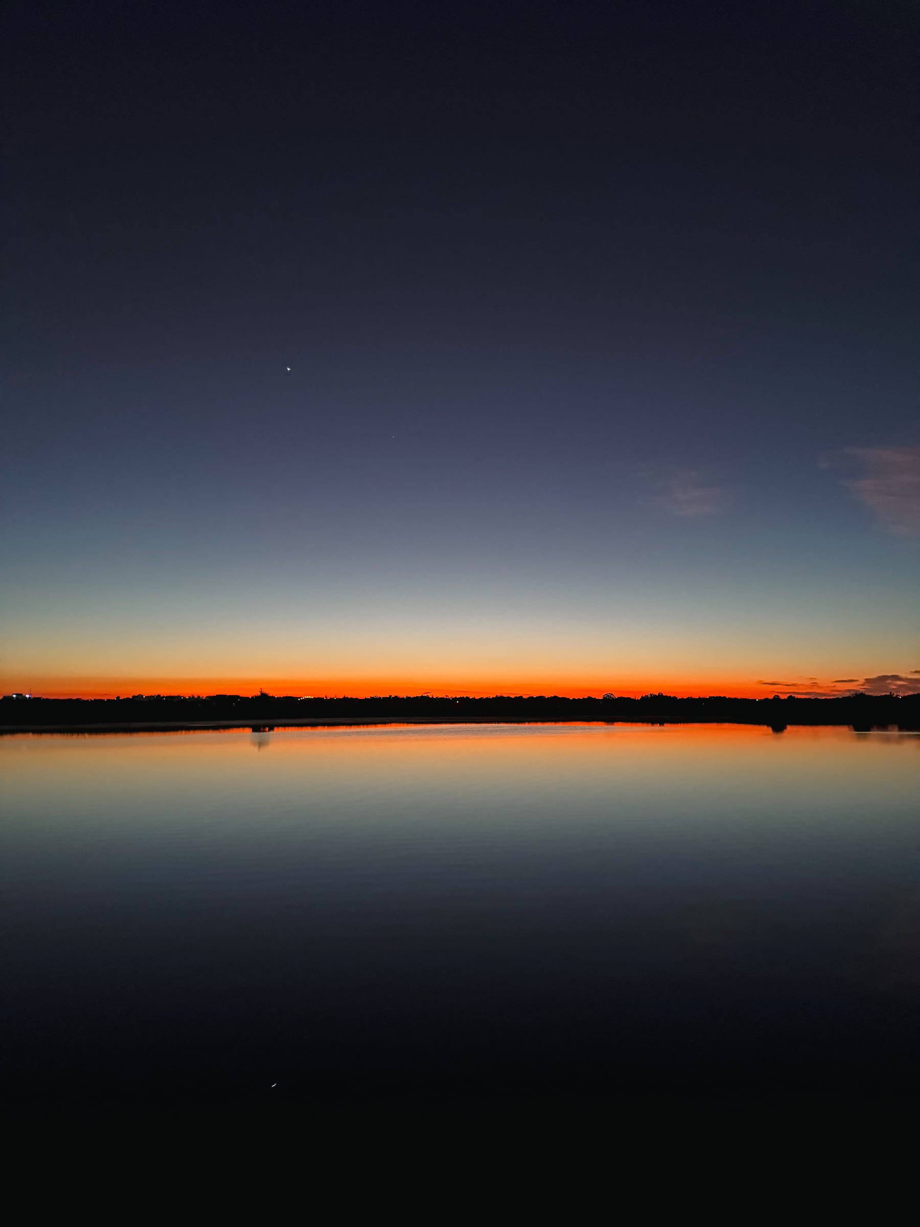 Crescent over the lake